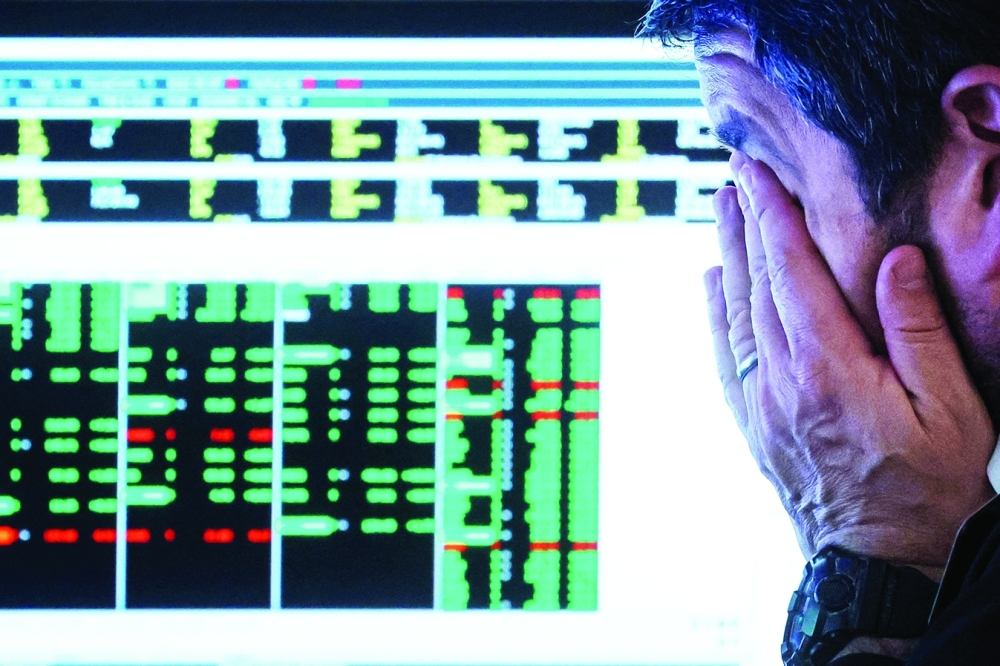 A trader works on the floor of the NYSE in New York. — Reuters