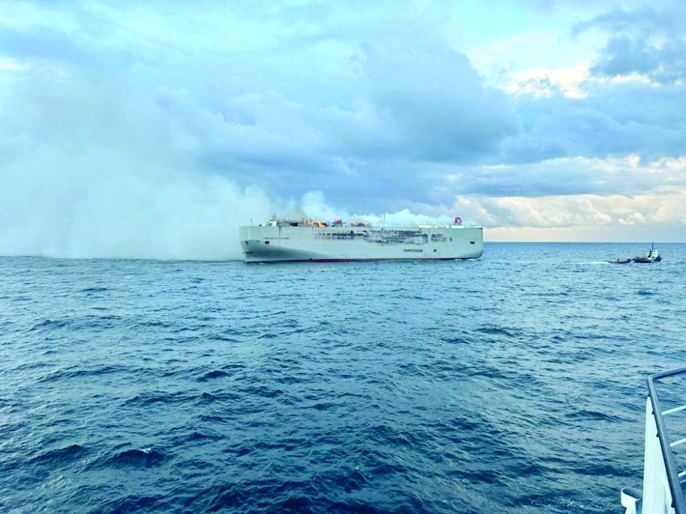 Smoke rises as a fire broke out on the cargo ship Fremantle Highway. — Reuters
