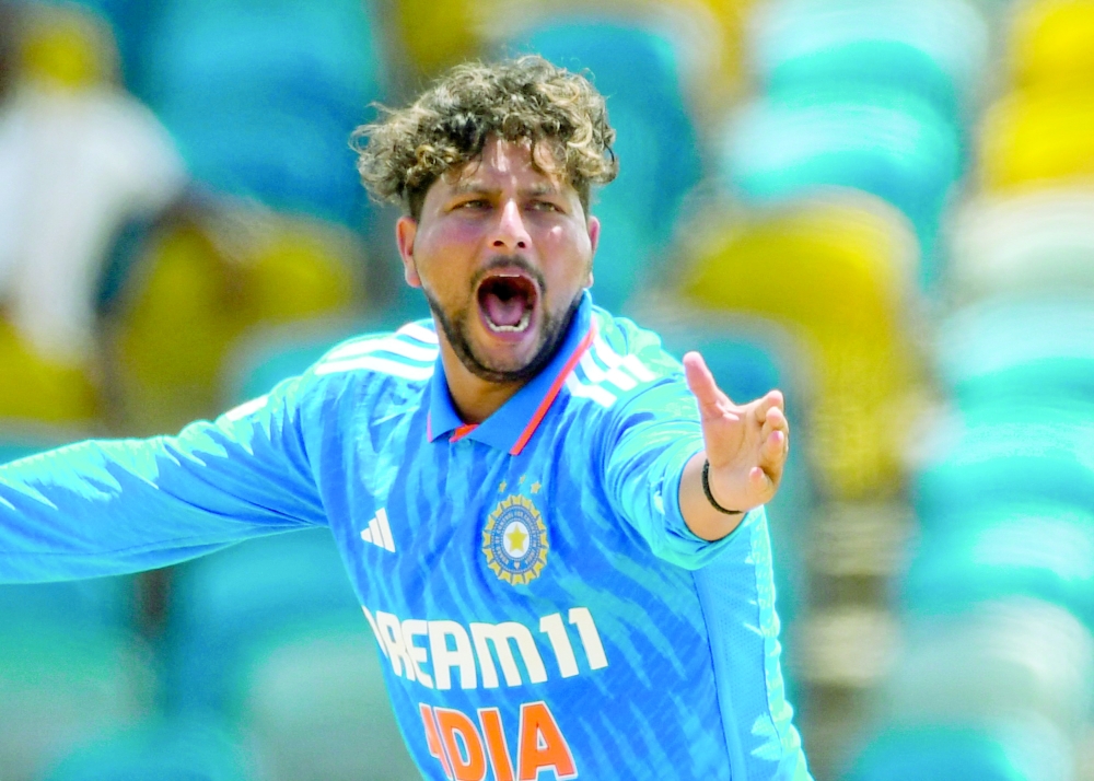 Kuldeep Yadav celebrates the dismissal of Yannic Cariah of West Indies during the first One Day International (ODI) — AFP

