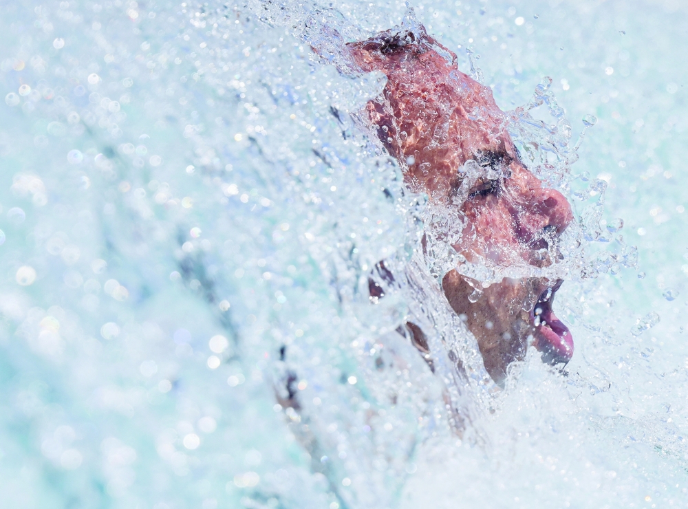 An Egyptian man cools off in the water amid a heatwave, at a Red Sea resort in Hurghada on Thursday. — Reuters
