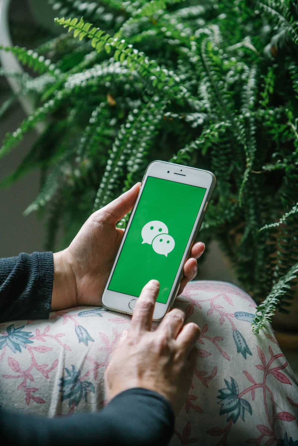 A person demonstrates how to use WeChat, in Hong Kong on Jan. 3, 2019. (Kenneth Tsang/ The New York Times)