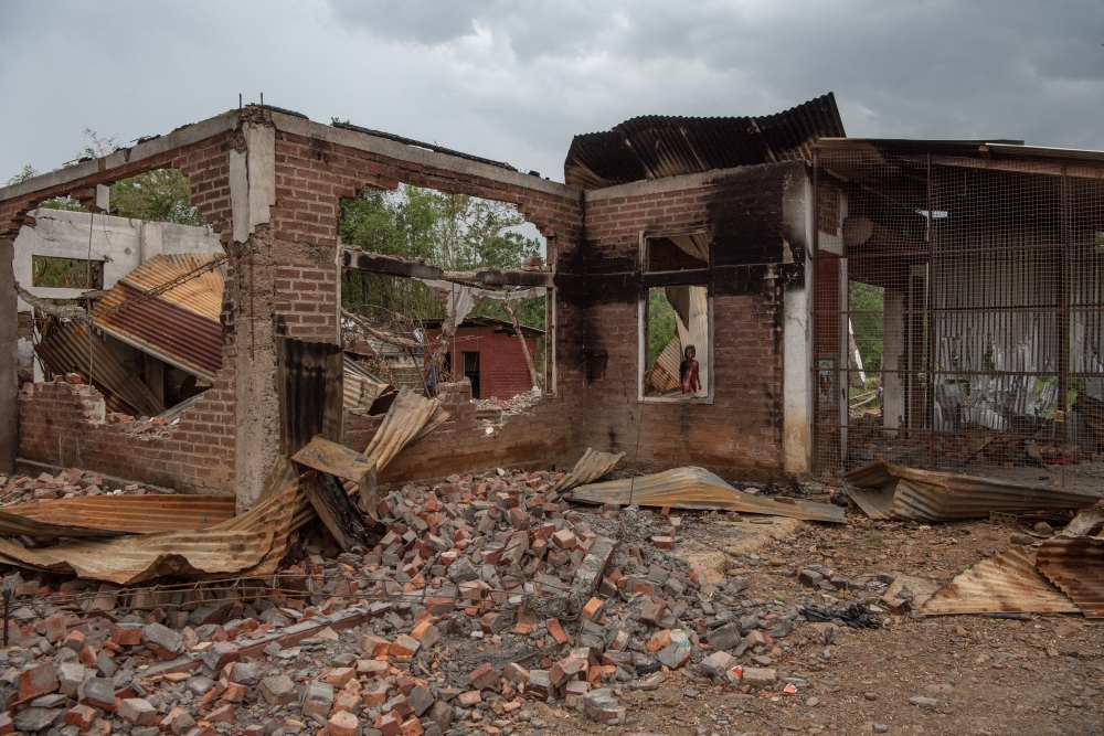A destroyed house in the Churachandpur District of Manipur State, India on May 31, 2023. (Saumya Khandelwal/The New York Times)