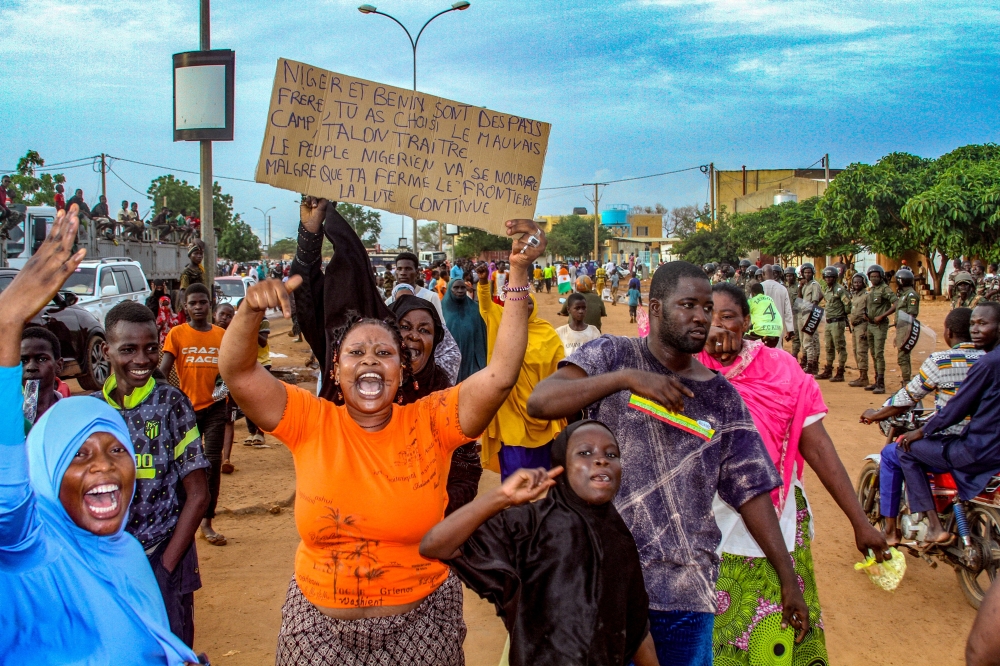 Niger's junta supporters take part in a demonstration in front of a French army base in Niamey, Niger. Reuters file photo
