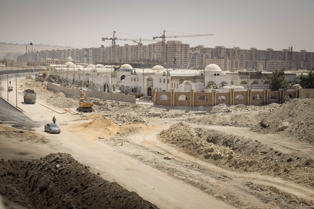 Construction of highways and roadworks in the Fustat area of Cairo, on Aug. 12, 2023.  (Sima Diab/The New York Times)
