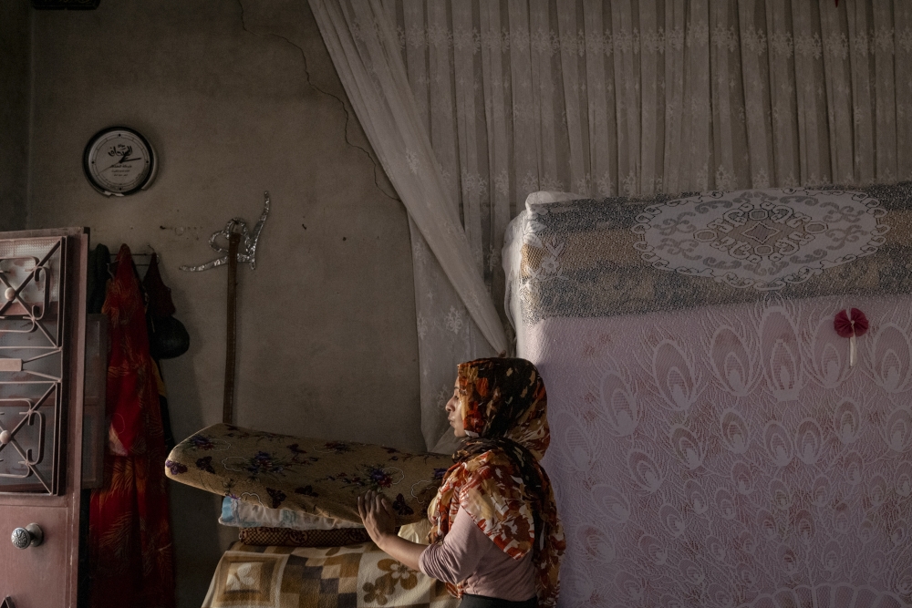 Henna Hassan, 30, Fatima al-Miree’s daughter, in their home in Jindires, Syria, on Aug. 8, 2023. (Nicole Tung/The New York Times)