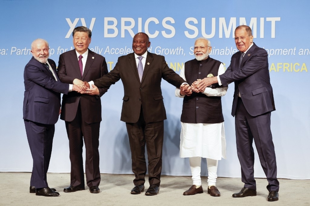 Leaders pose for a BRICS family photo during the 2023 BRICS Summit at the Sandton Convention Centre in Johannesburg on August 23. - AFP
