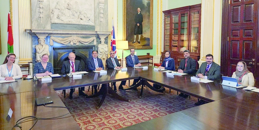 Omani and British delegates during their second meeting in London.
