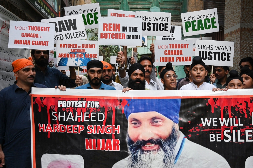 Members of Pakistan's Sikh community take part in a protest in Peshawar on September 20, 2023