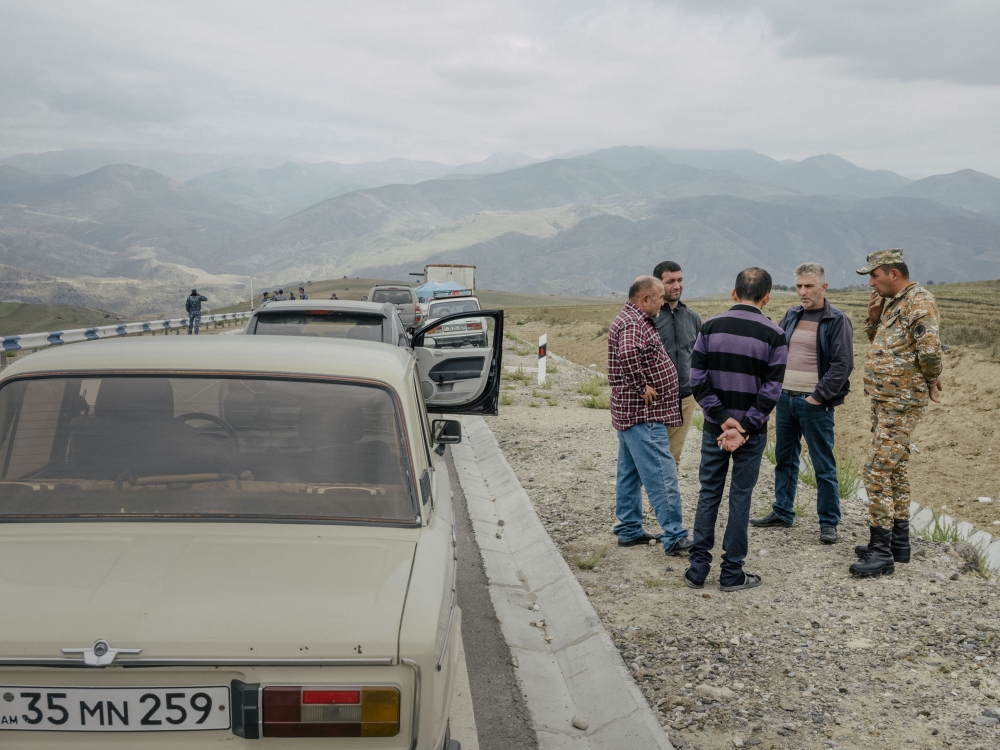 Armenian police at an Armenian border outpost on the road that crosses Azerbaijani territory to the disputed Nagorno-Karabakh enclave, near the village of Kornidzor, Armenia, Sept. 22, 2023. (Nanna Heitmann/The New York Times)