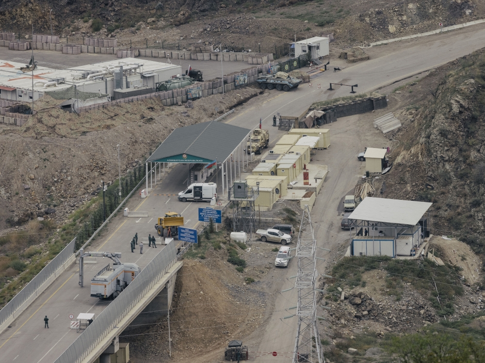 A border crossing between Armenia and Azerbaijan, along with a base for Russian peacekeepers in Nagorno-Karabakh, near Kornidzor, Armenia, on Saturday, Sept. 23, 2023. (Nanna Heitmann/The New York Times)