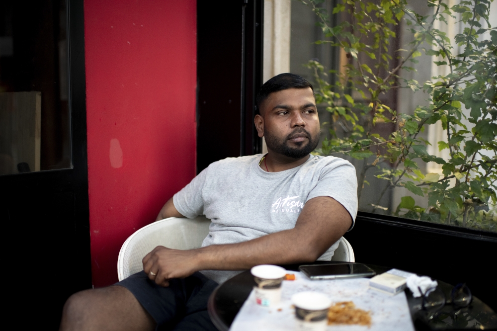 Tharshan Selvarajah, the 2023 winner of the “Grand Prize of the Traditional French Baguette,” at his bakery, “Au levain des Pyrénées”, in Paris on Sept. 14, 2023.  (Dmitry Kostyukov/The New York Times)