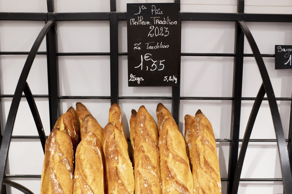 Freshly baked baguettes for sale at the bakery of Tharshan Selvarajah, the 2023 winner of the “Grand Prize of the Traditional French Baguette,” on the fringes of eastern Paris on Sept. 14, 2023. (Dmitry Kostyukov/The New York Times)