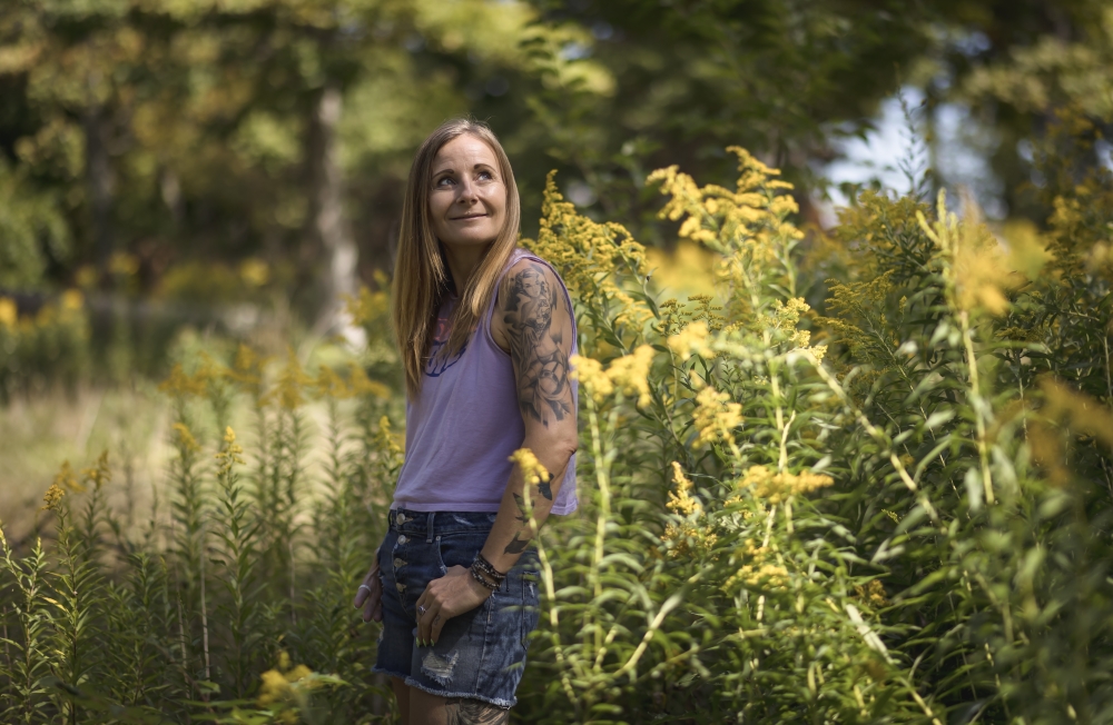 Kim Prosser walks along Lake Erie, thinking about her late son, Ashtyn, who died by suicide at 19, in Wheatley, Ontario, Canada on Sept. 15, 2023. (Tara Walton/The New York Times)