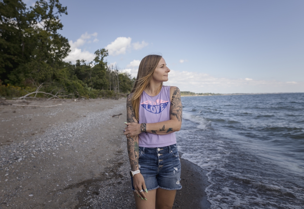 Kim Prosser walks along Lake Erie, thinking about her late son, Ashtyn, who died by suicide at 19, in Wheatley, Ontario, Canada on Sept. 15, 2023. (Tara Walton/The New York Times)