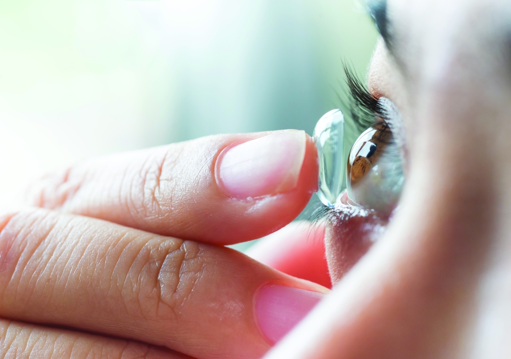 Contact lenses are transparent plastic lenses placed directly on the cornea of the eye for either therapeutic or cosmetic purposes.