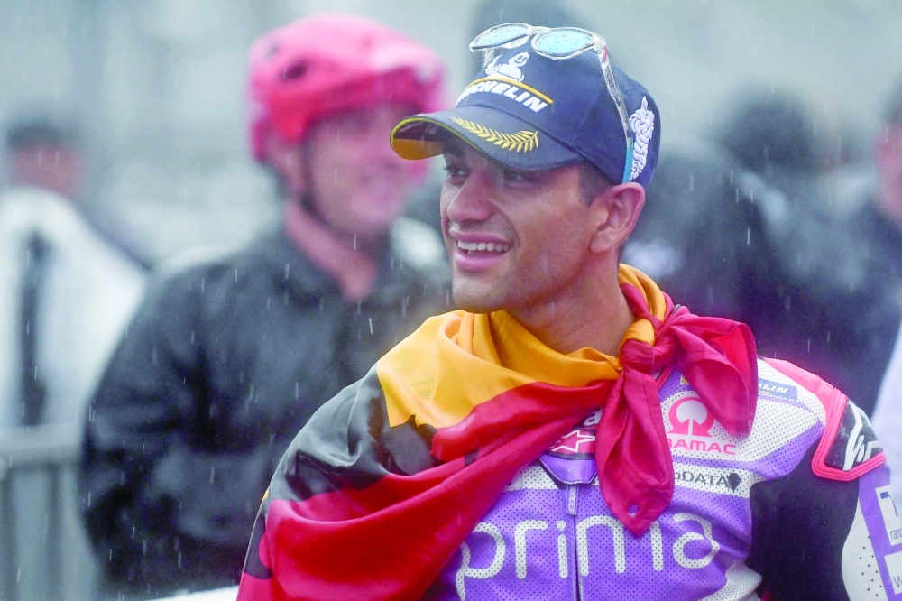 Jorge Martin of Spain celebrates his victory at the parc ferme of the MotoGP Japanese Grand Prix at the Mobility Resort Motegi. — AFP