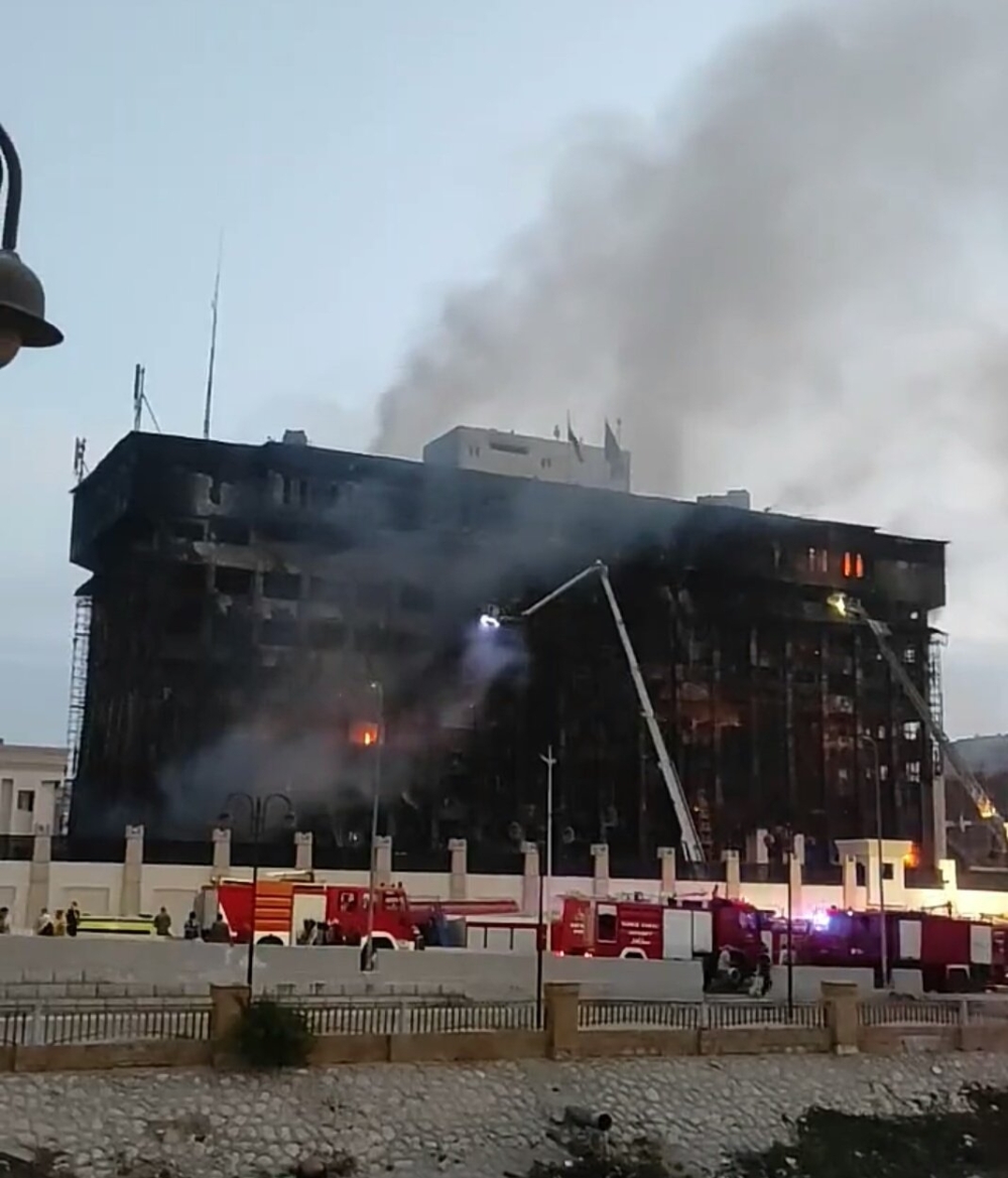 Footage on local media showed smoke rising from the entirely blackened multi-story building.