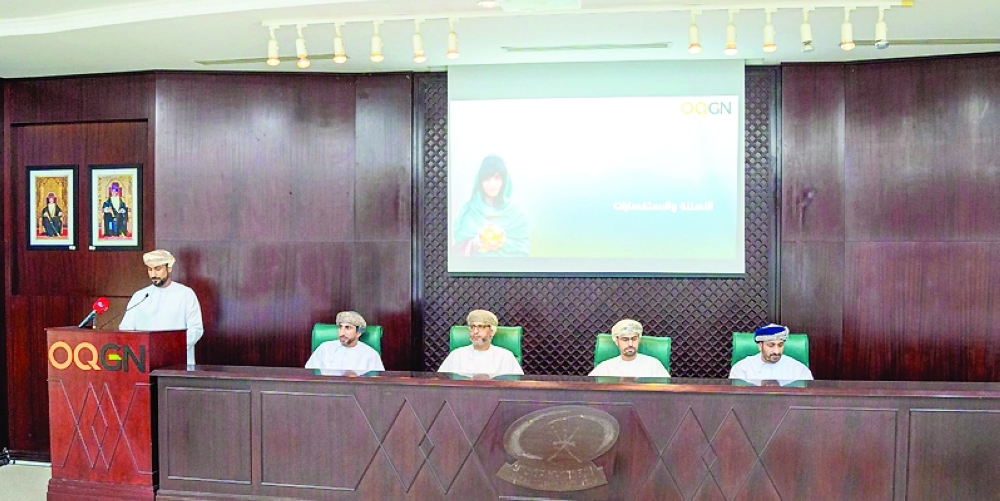 OQGN and MSX officials are seen during the presentation.