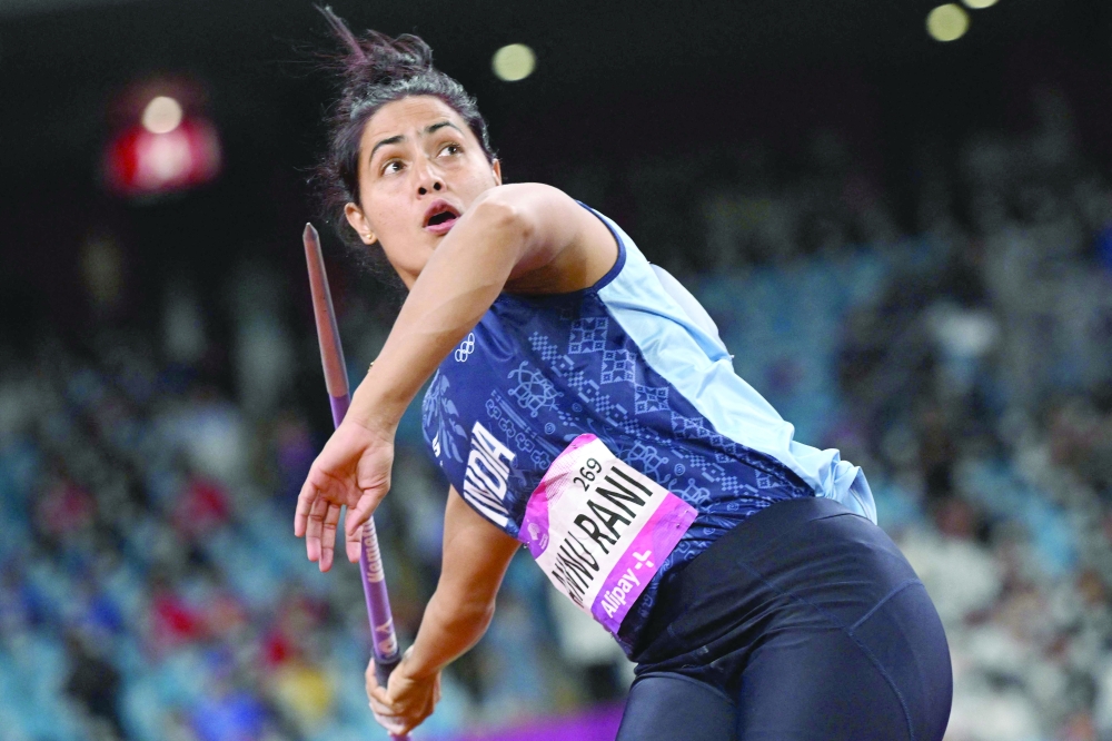 India's Annu Rani competes in the women's javelin throw final athletics event during the 2022 Asian Games in Hangzhou. Rani won the gold. —AFP