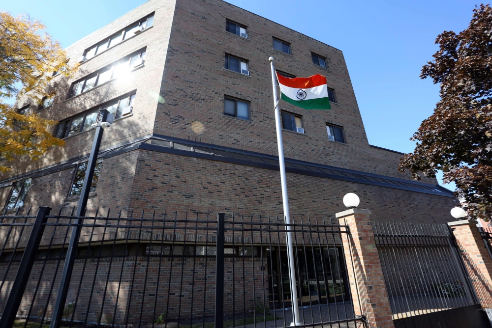 A India flag waves in the wind at the High Commission of India in Ottawa, Canada. 