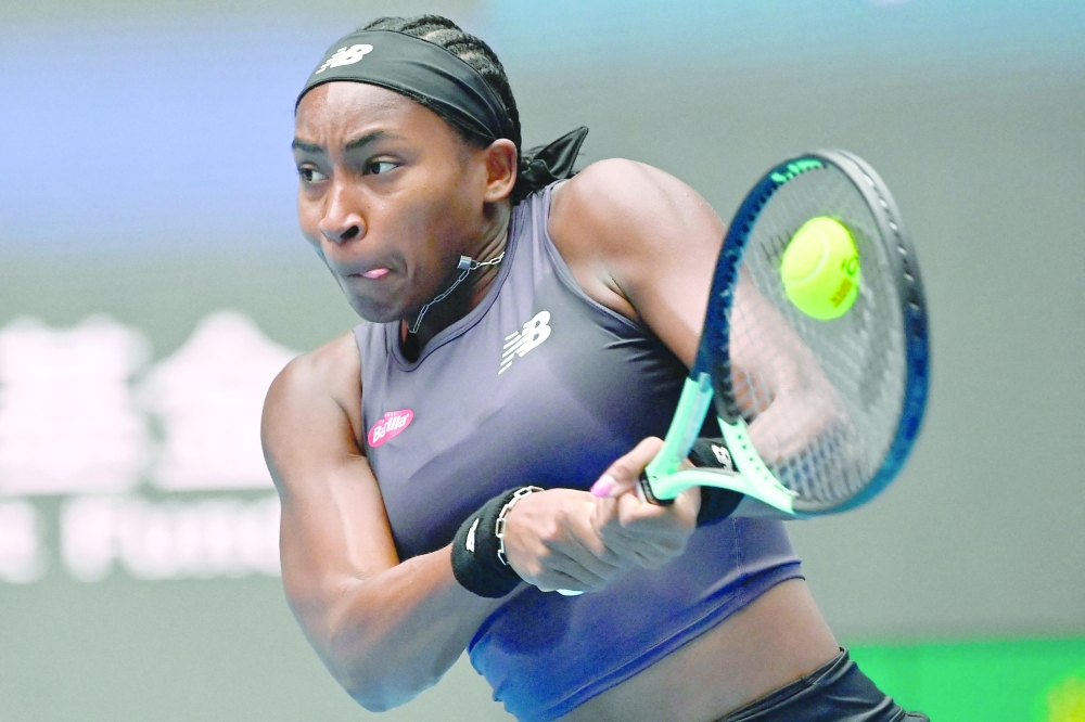 USA`s Coco Gauff hits a return to Russia's Veronika Kudermetova during their women's singles match of the WTA China Open tennis tournament in Beijing on October 5, 2023.