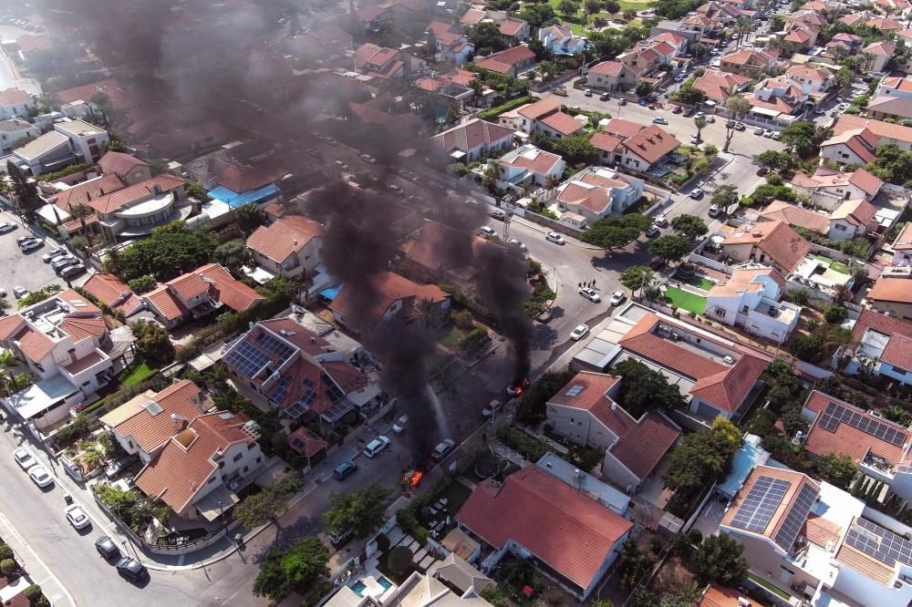 The Palestinian group Hamas launched the biggest attack on Israel in years on Saturday in a surprise assault that combined gunmen crossing into several Israeli towns with a heavy barrage of rockets fired from the Gaza Strip.