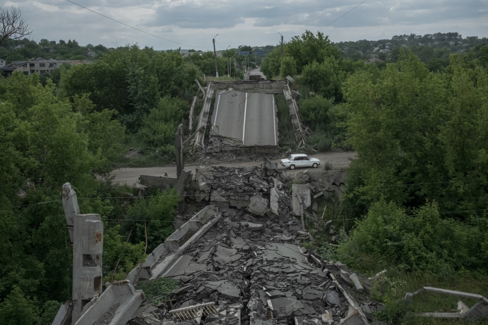 A destroyed overpass in Kupiansk, Ukraine.
