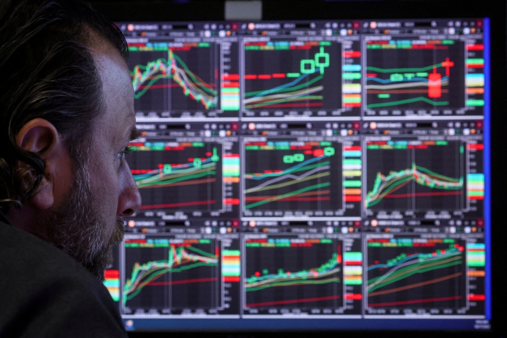 A trader works on the floor of the NYSE in New York. — Reuters