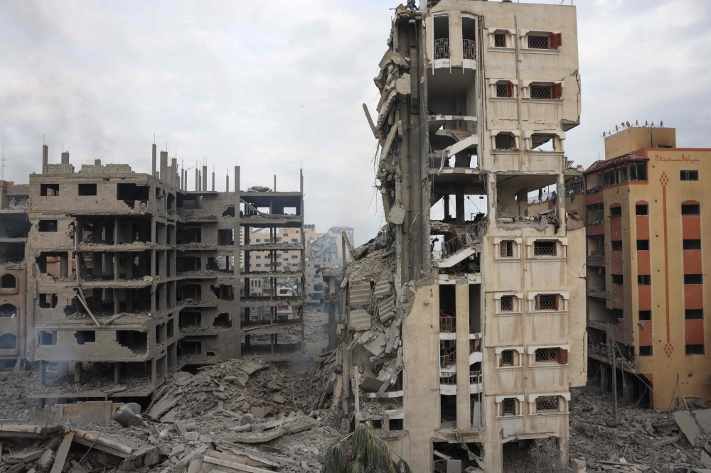 A picture shows a view of the destruction from Israeli airstrikes in Gaza City's al-Rimal neighbourhood 