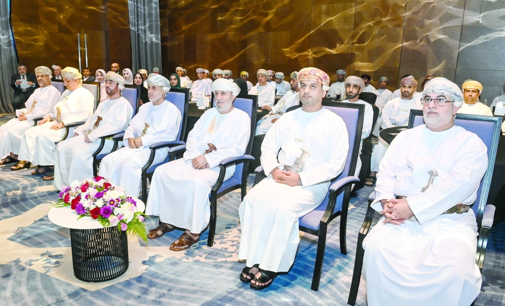 Sayyid Mohammed bin Sultan al Busaidy, Deputy Chairman of the Supreme Judicial Council, and other dignitaries at the ceremony in Muscat on Tuesday. — ONA