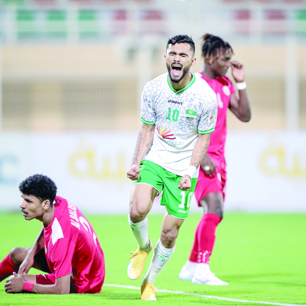 Al Nahda's Salah al Yahyai celebrates the goal
