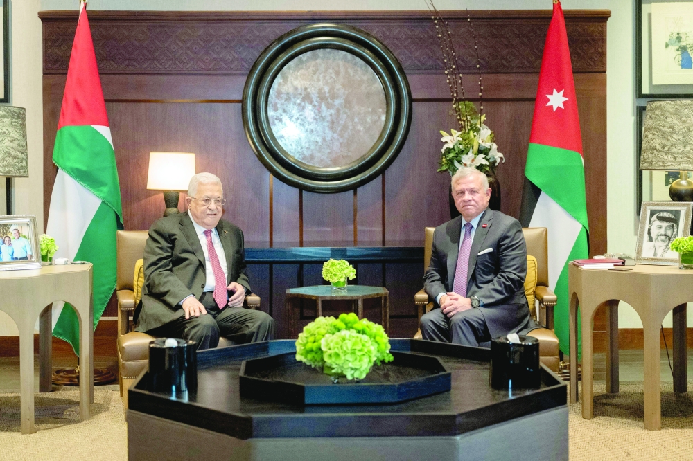 Jordan's King Abdullah II meets with Palestinian President Mahmud Abbas in Amman. - Reuters