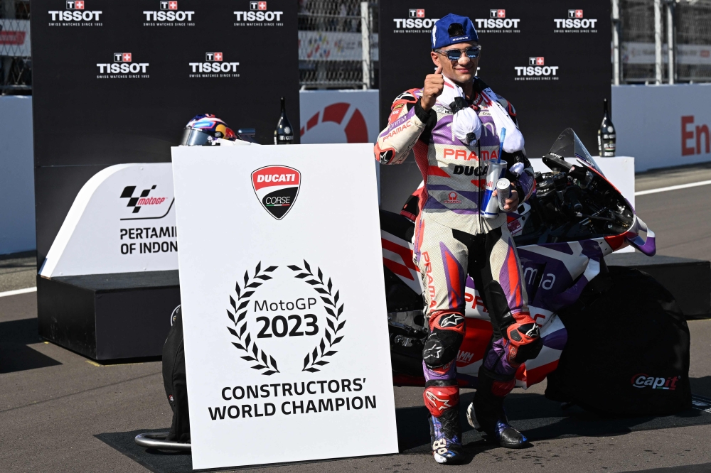Jorge Martin celebrates celebrates with his medal following the sprint race of the Indonesian Grand Prix MotoGP.—AFP)

