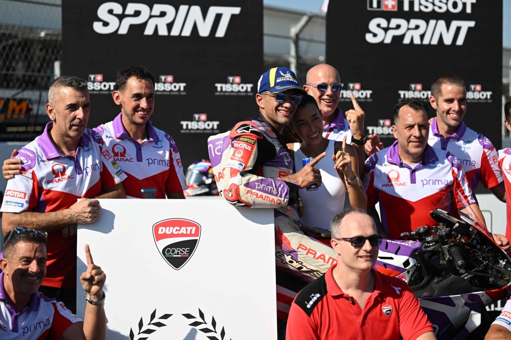 Jorge Martin (C) celebrates with his team following the sprint race of the Indonesian Grand Prix MotoGP.—AFP