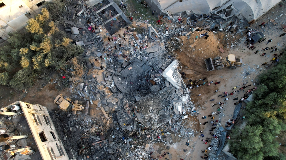 A view shows the remains of a Palestinian house destroyed in Israeli strikes in the central Gaza Strip 