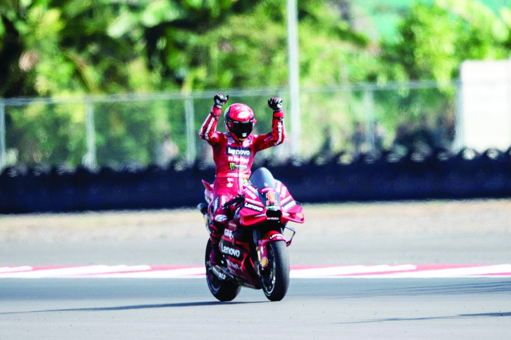 Ducati Lenovo's Francesco Bagnaia celebrates after winning the MotoGP race.—Reuters