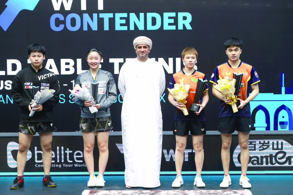 Women's Mixed Doubles winners at the Sultan Qaboos Sport Complex podium