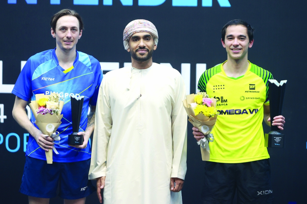 men's Mixed Doubles winners at the Sultan Qaboos Sport Complex podium