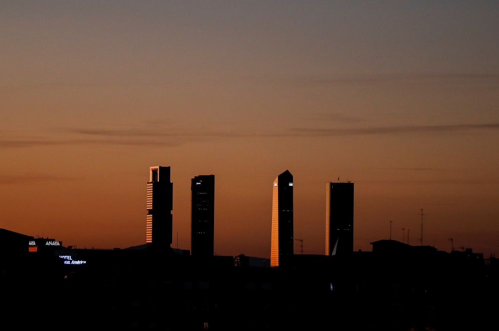 The Four Towers business district skyline is seen at sunset in Madrid