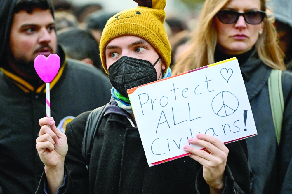 People protest against the bombing in Gaza outside the Chancellery in Berlin on Wednesday. - AFP