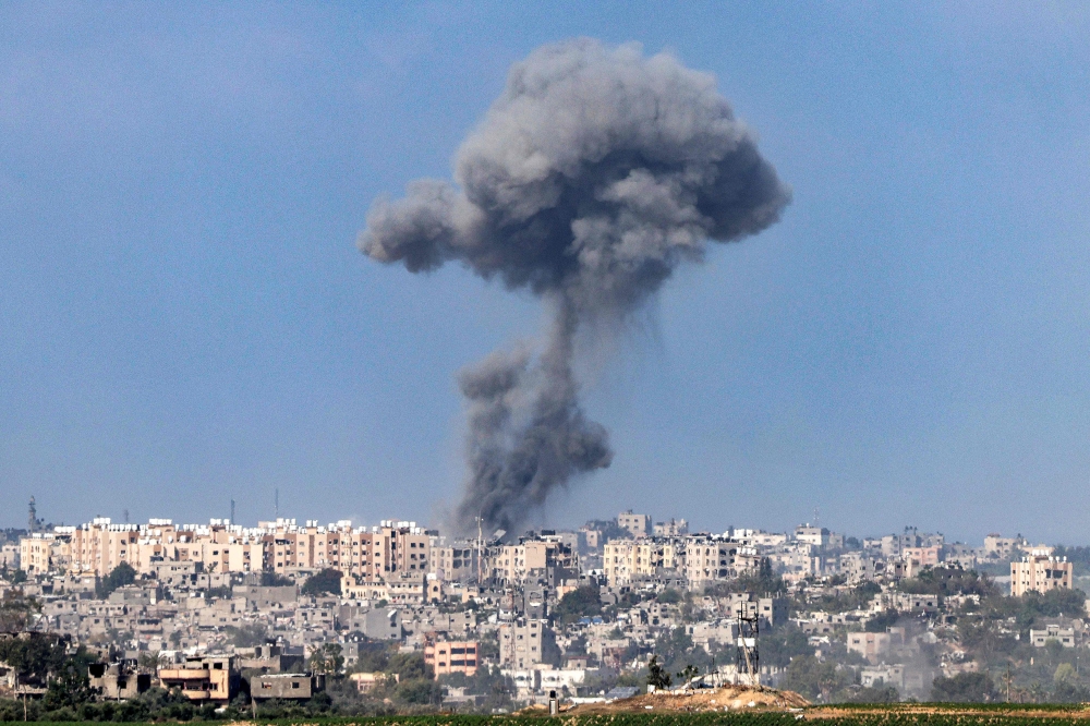 This picture taken from Israel's southern city of Sderot shows a smoke plume erupting during Israeli bombardment