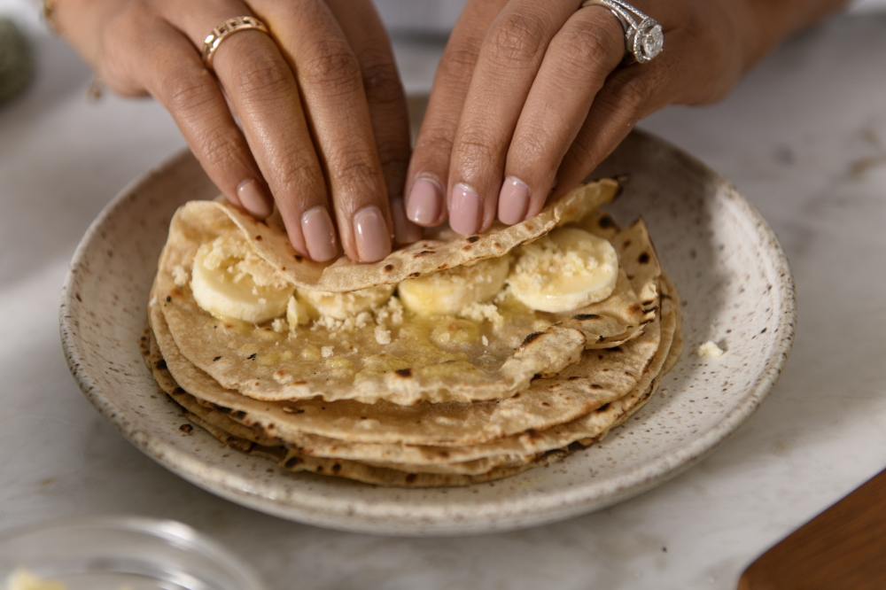 Sliced banana and roti 