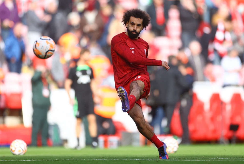 Mohamed Salah during the warm up before the match.—Reuters
