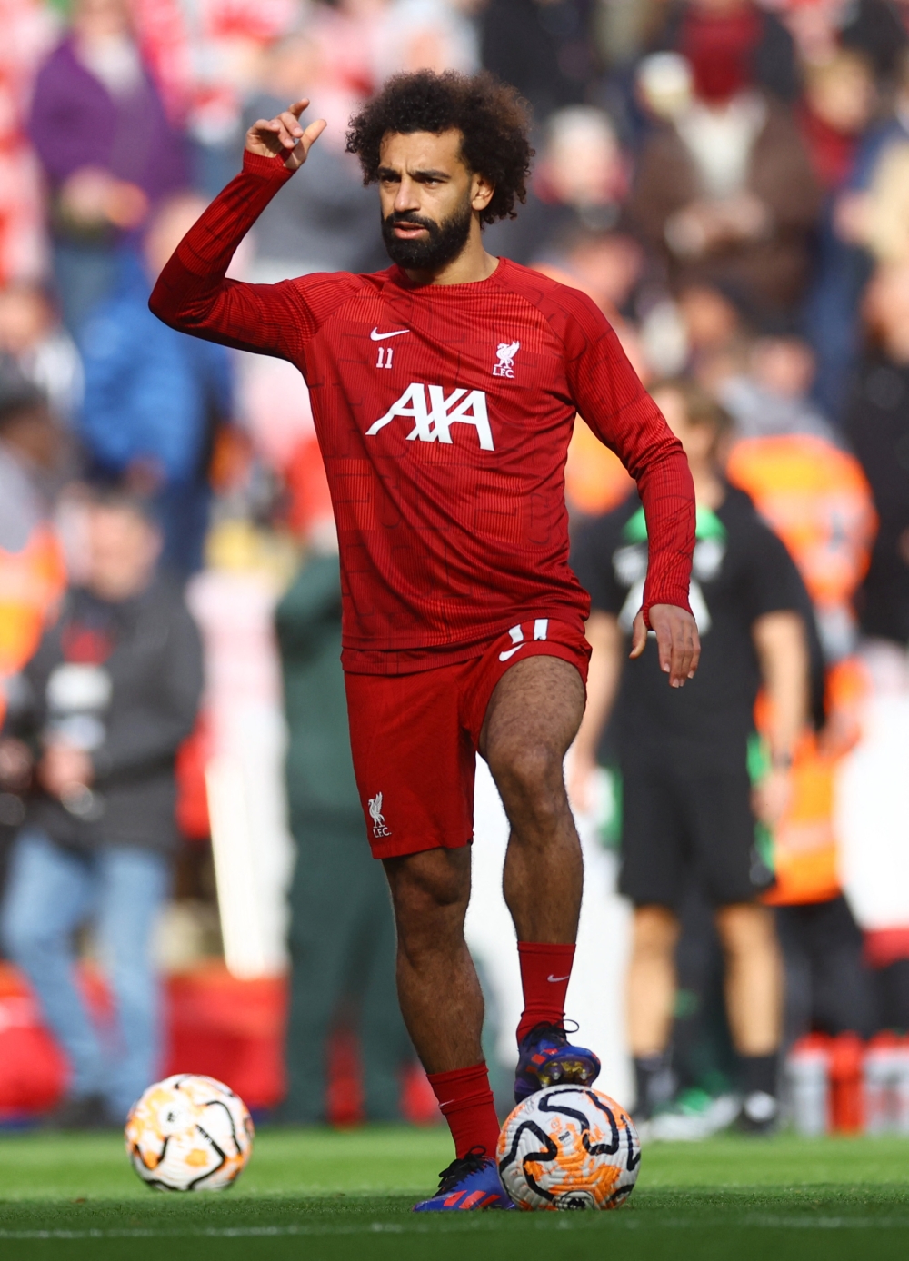 Mohamed Salah during the warm up before the match.—Reuters