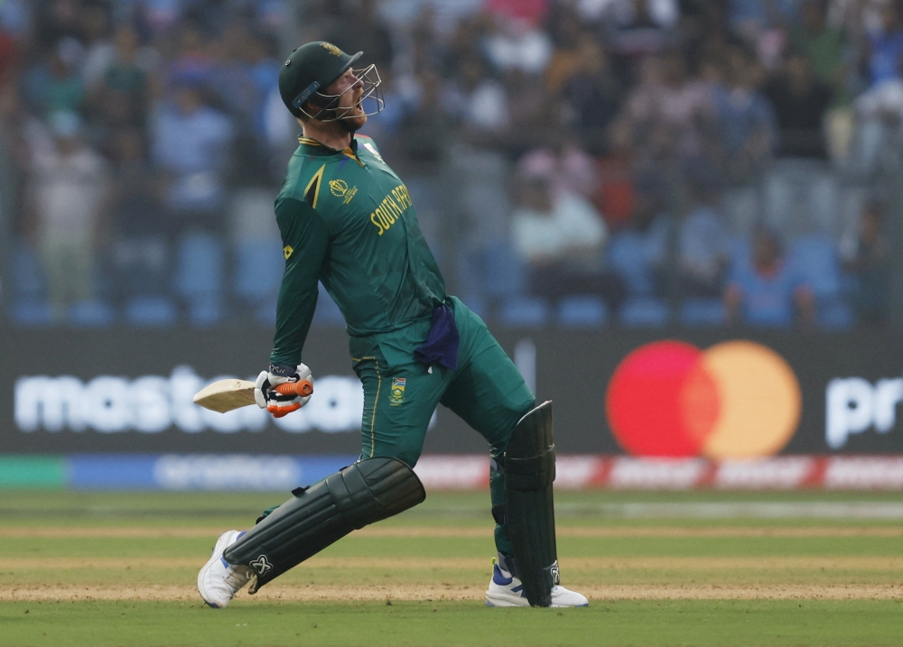 Africa's Heinrich Klaasen celebrates after reaching his century.—Reuters