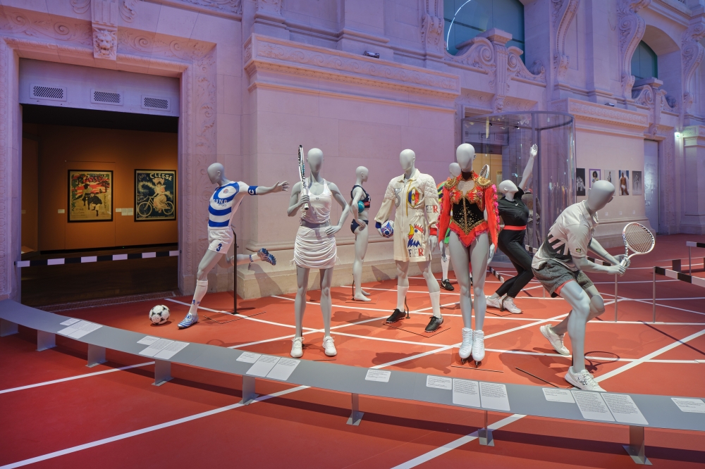 Outfits designed for athletes include such looks as the red skating dress that Christian Lacroix designed for the French champion Surya Bonaly, on display in the exhibition Fashion and Sports: From One Podium to Another at the Muse des Arts Dcoratifs in Paris. (Christophe Delliere via The New York Times)