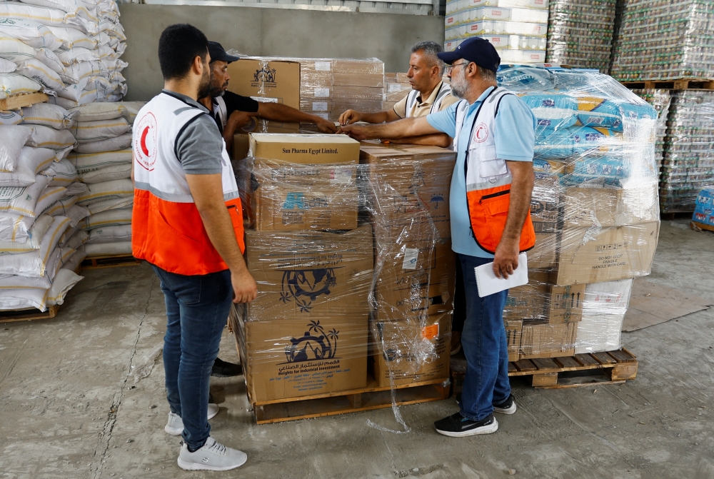 The United Nations says at least 100 trucks a day are needed to provide the basic needs of Gaza's 2.4 million inhabitants 