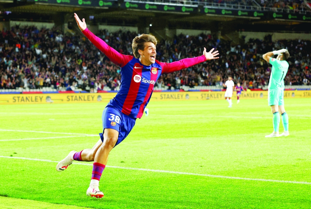 FC Barcelona's Marc Guiu celebrates scoring their first goal against Athletic Bilbao. -- Reuters 