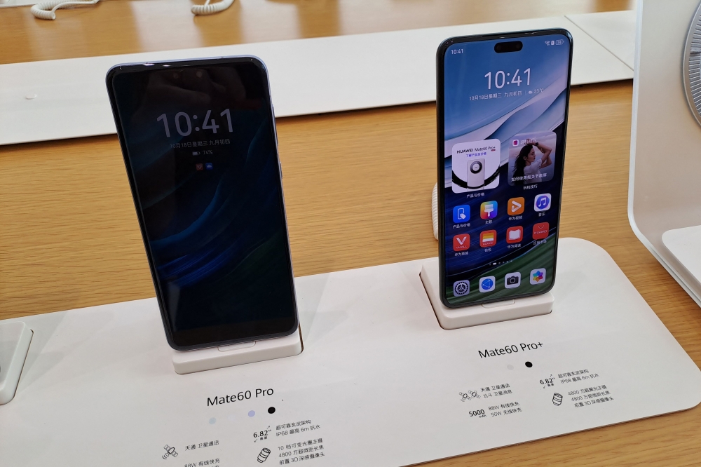 Huawei Mate 60 series smartphones displayed at a store in Shenzhen in China's southern Guangdong province. - AFP

