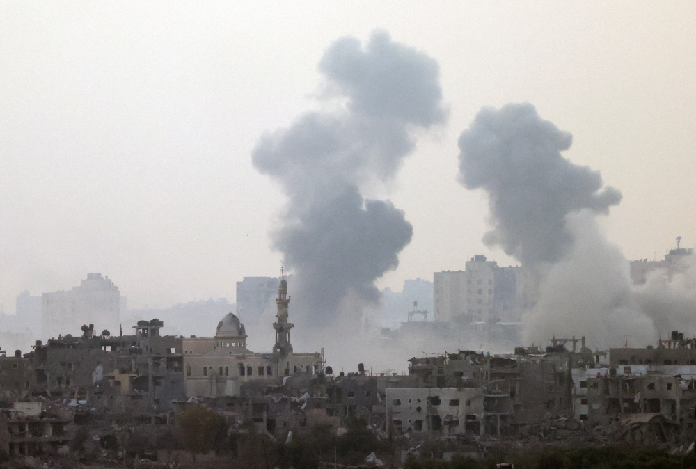 Smoke is rising after an Israeli strike on Gaza 
